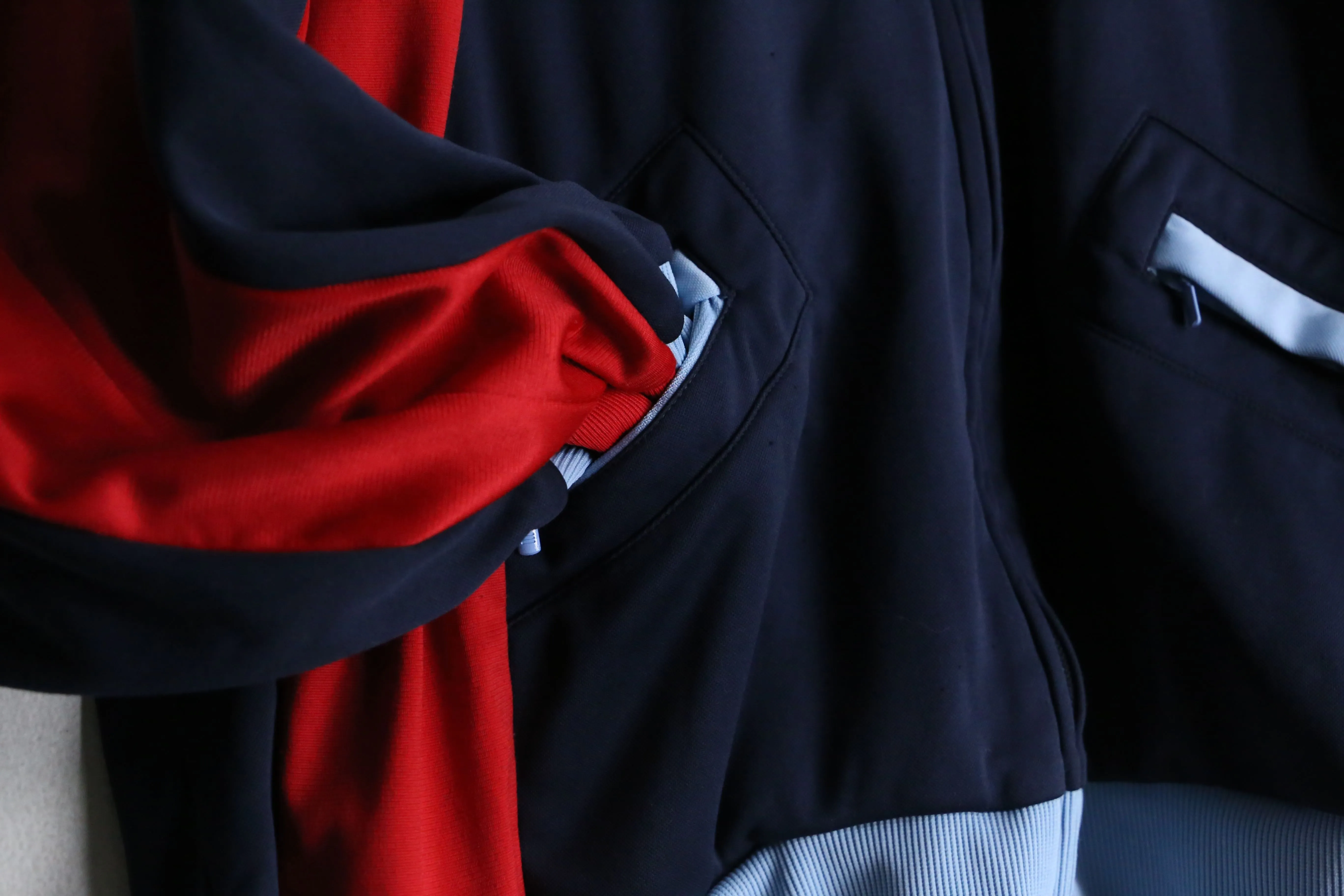 "Re:make" navy × red track jacket