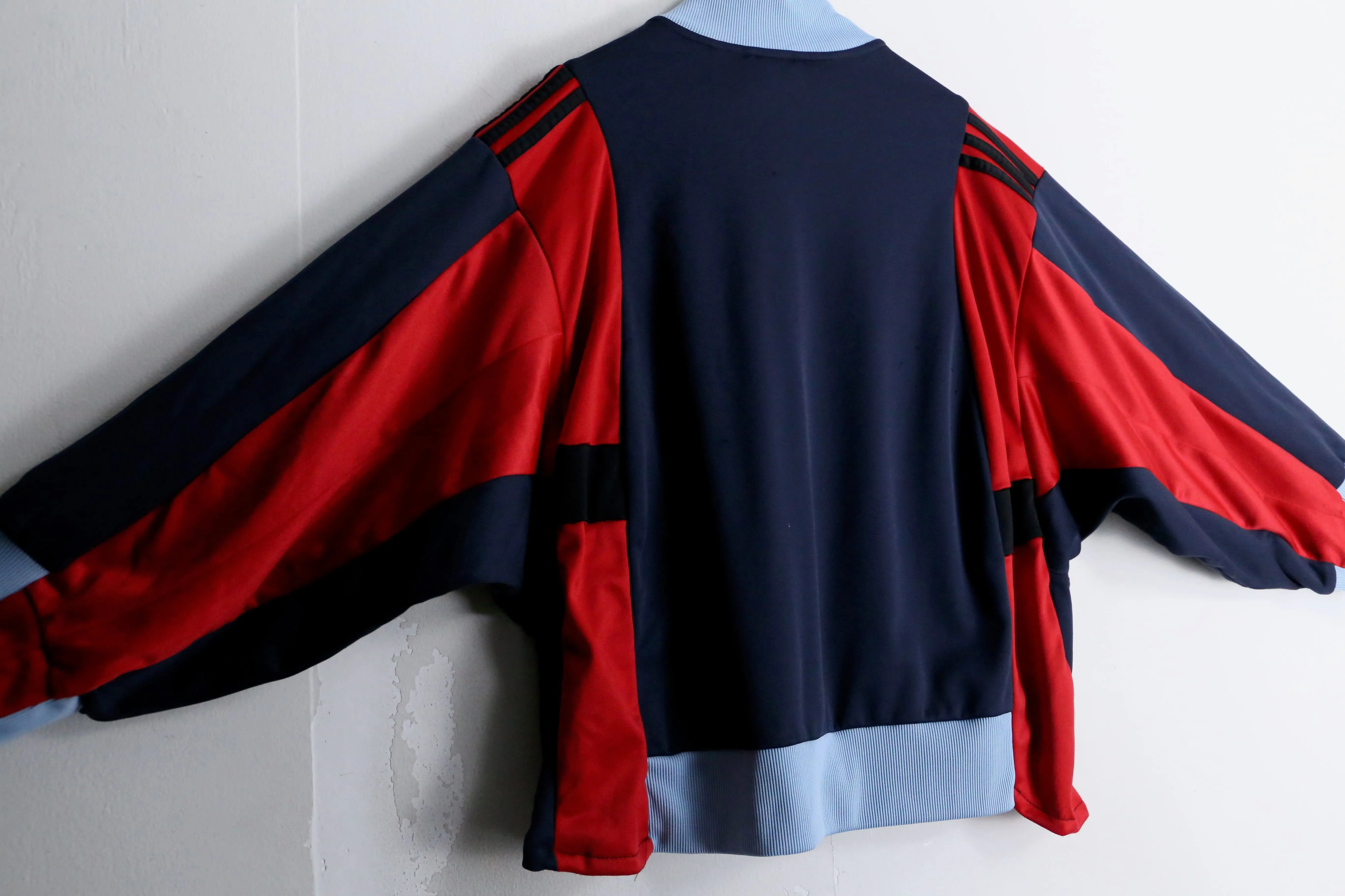 "Re:make" navy × red track jacket