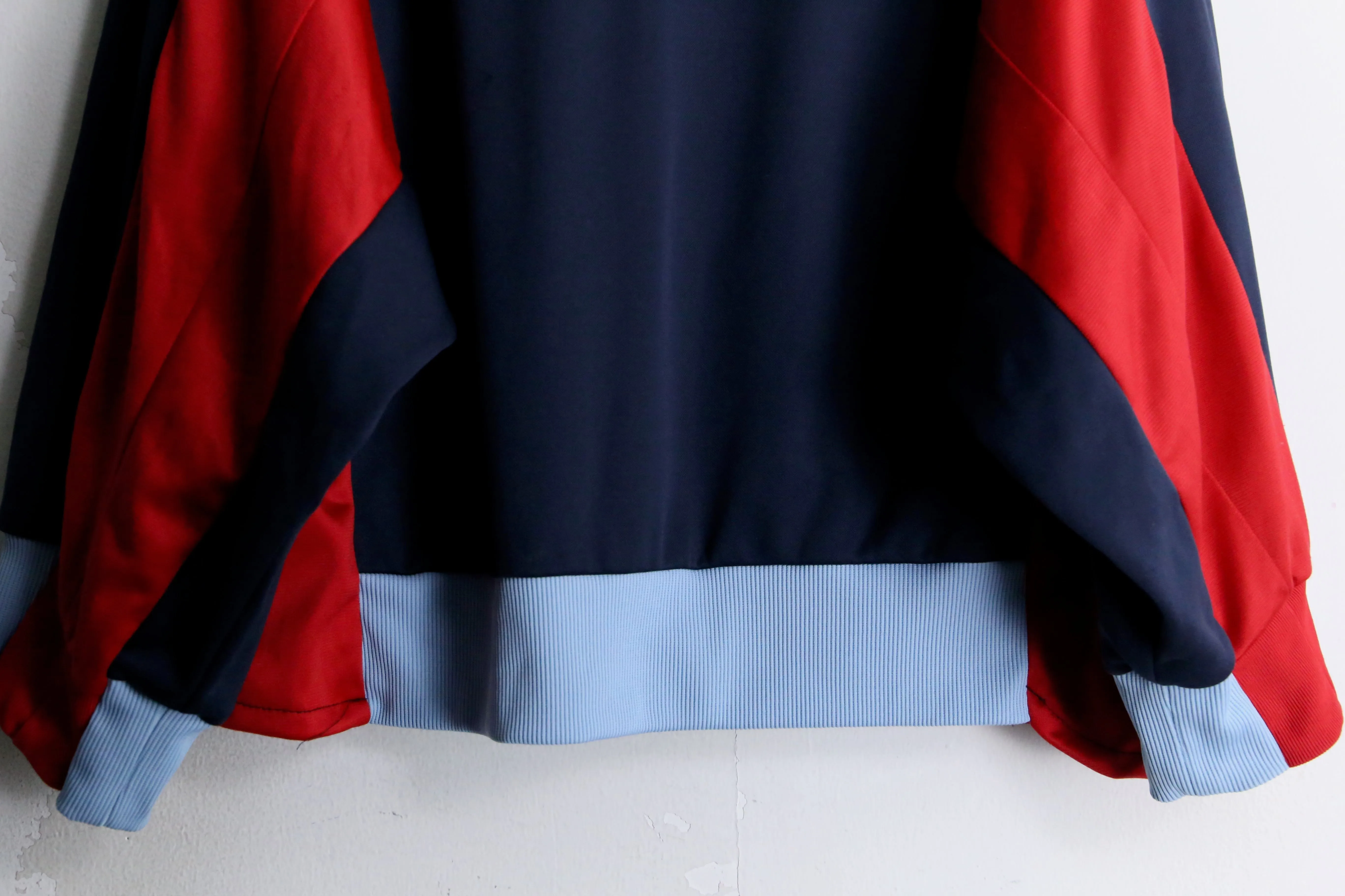 "Re:make" navy × red track jacket